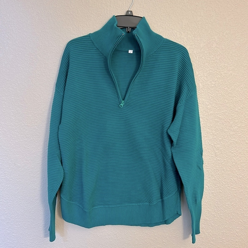 Women’s 3/4 zip green sweater size large.